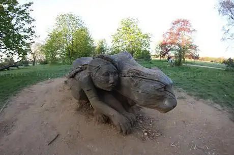 Girl with Jaguar Carving