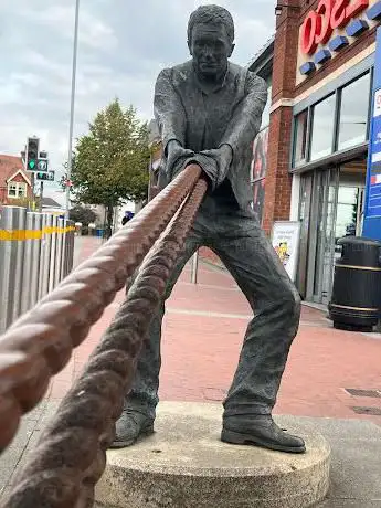 Hauling Man Sculpture