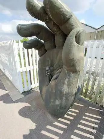 Hand With Chronos sculpture (1990) by Vincent Woropay